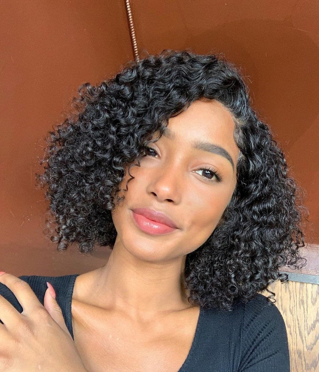 20. Deep Black Defined Curly Bob with Side Volume - Curly Bob Hairstyles