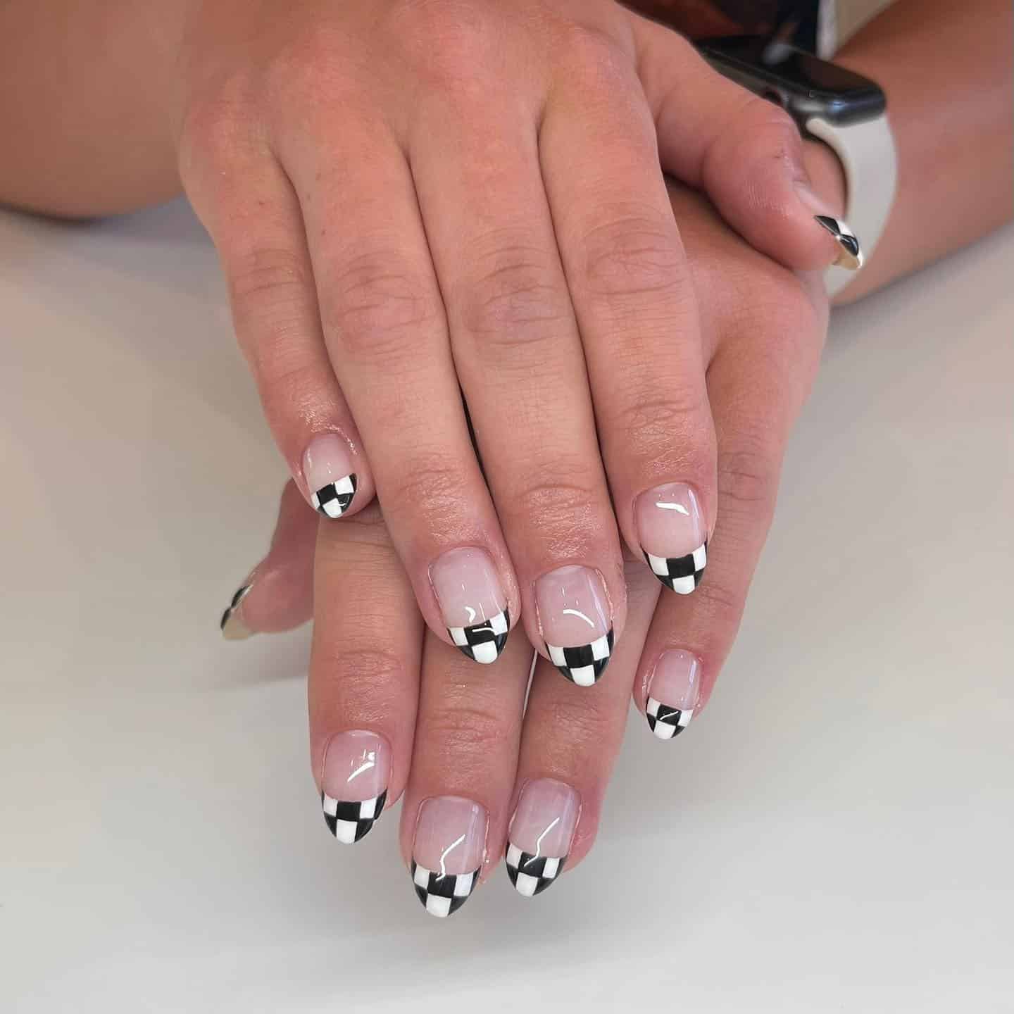 7. Minimal Checkered French Tips - checkers nail ideas