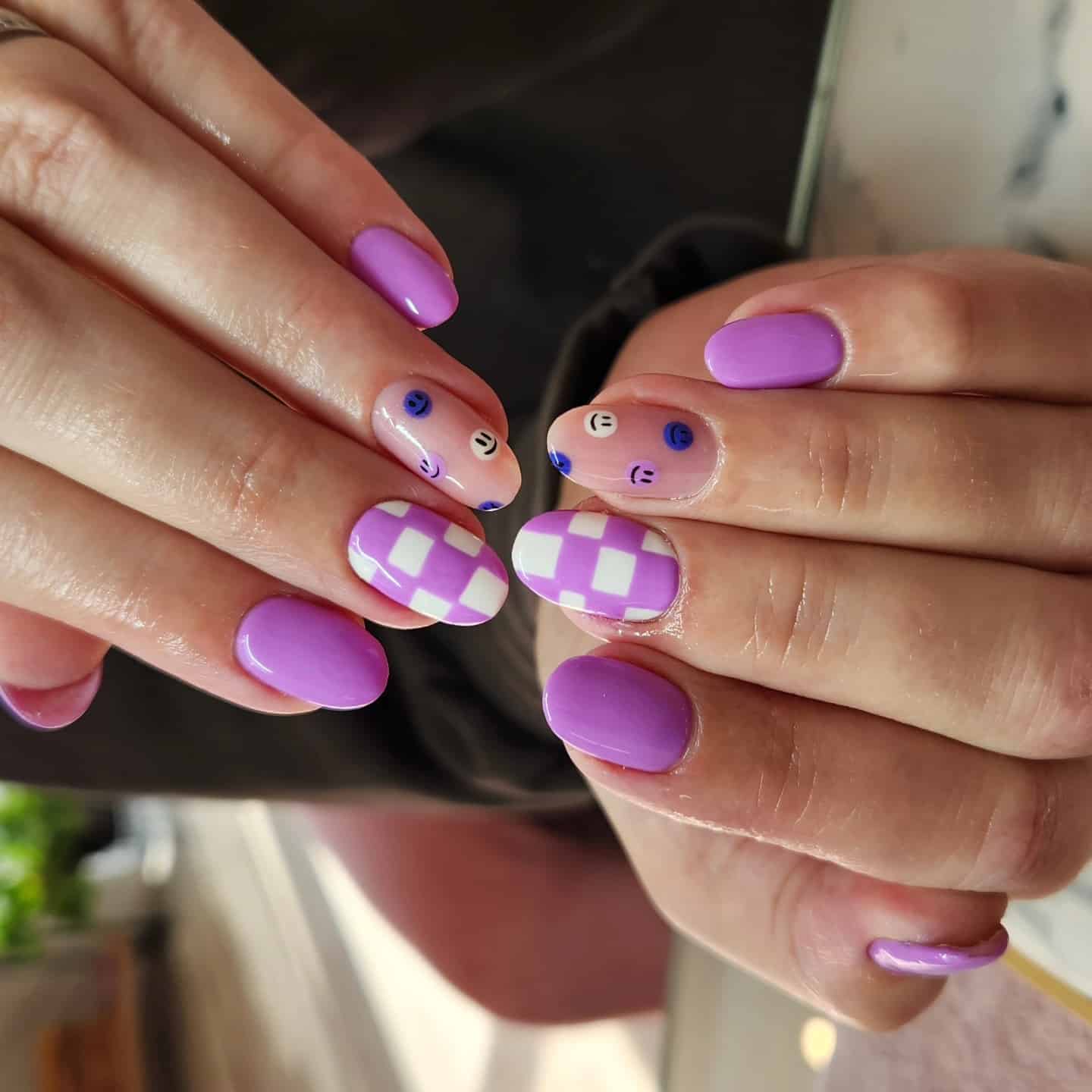 8. Pastel Purple Smiley & Checker Nails - checkers nail ideas