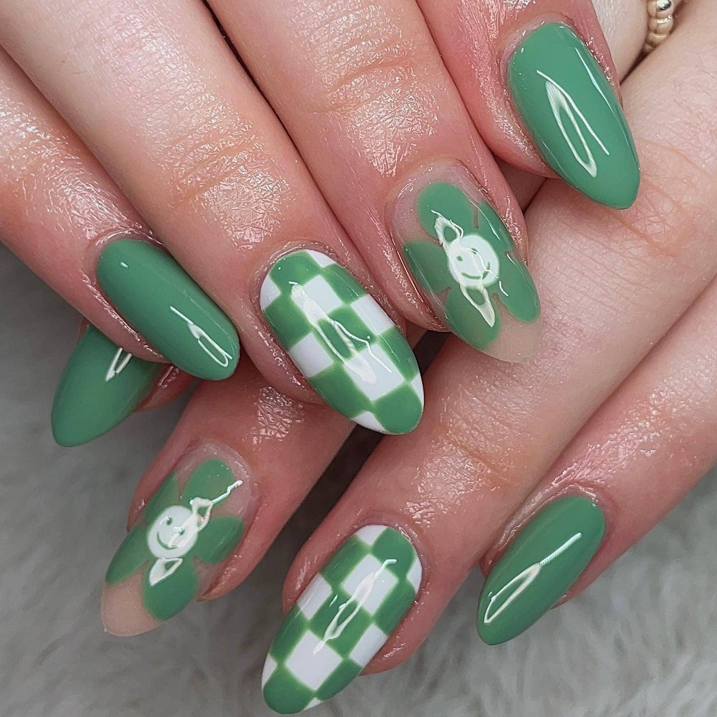 13. Sage Green Checker & Floral Accent Almond - checkers nail ideas