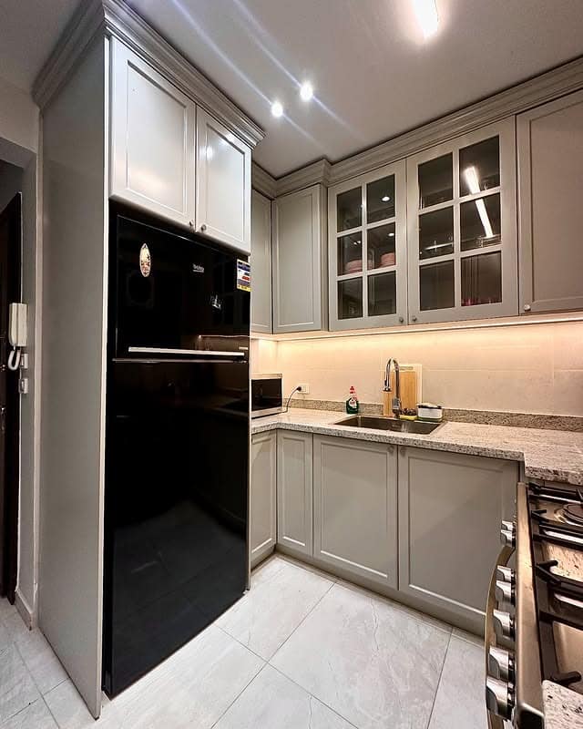 14. Classic Grey Shaker Kitchen with Warm Underlighting - vintage kitchen ideas