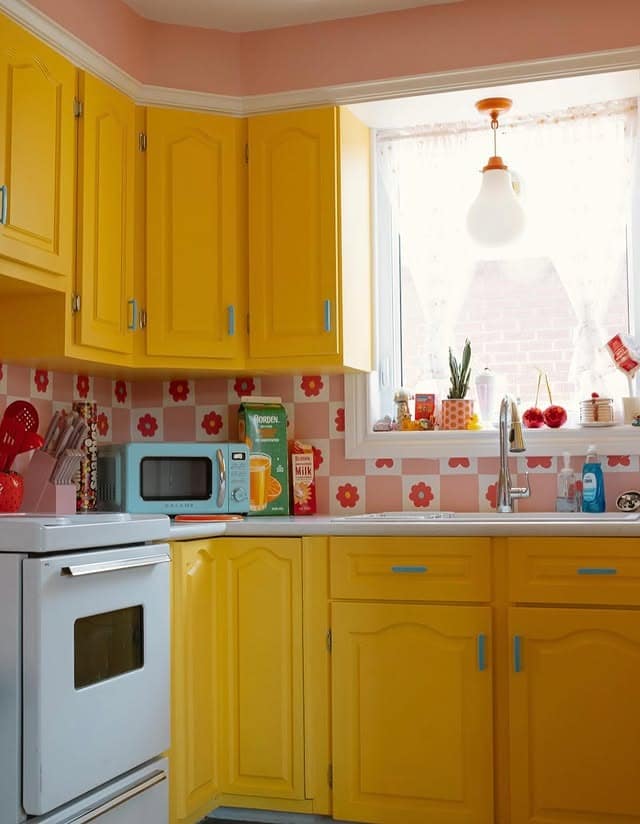 19. Retro Pop Kitchen in Sunshine Yellow and Coral - vintage kitchen ideas