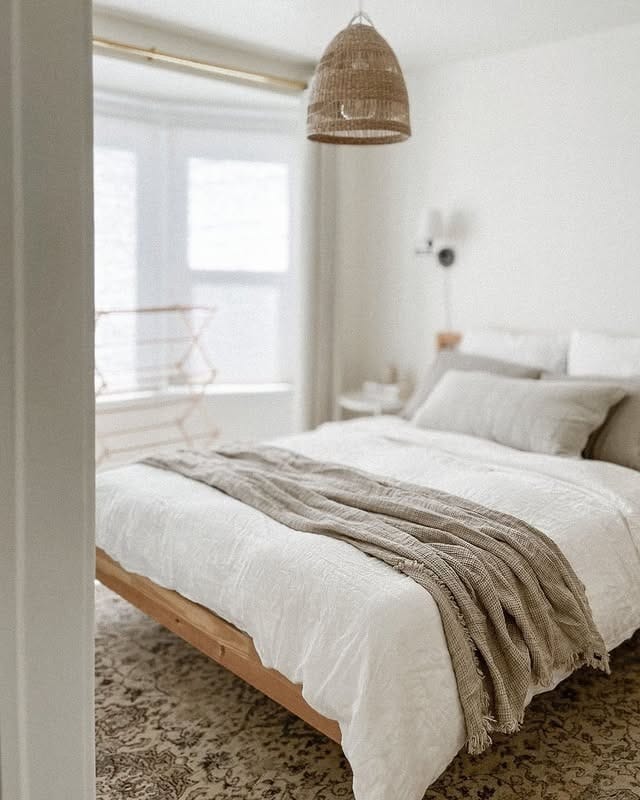5. Minimal Off-White Bedroom with Natural Textures - off white bedroom ideas