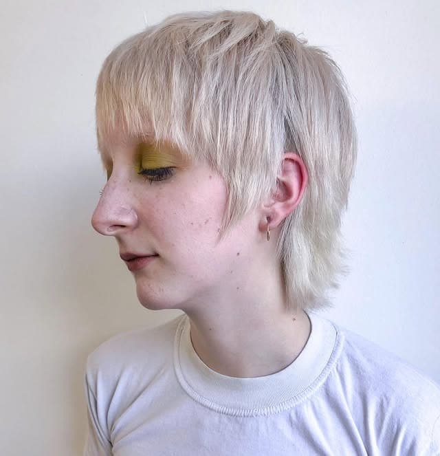 10. Platinum Blonde Feathered Shag Pixie - Shaggy Pixie Haircut