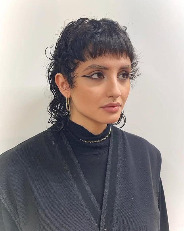 12. Jet Black Curly Shag Pixie Mullet - Shaggy Pixie Haircut