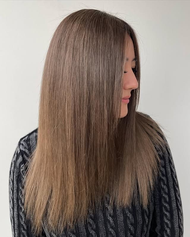 10. Long Layered Ash Brown with Subtle Cool Highlights - Light Ash Brown Hair Color