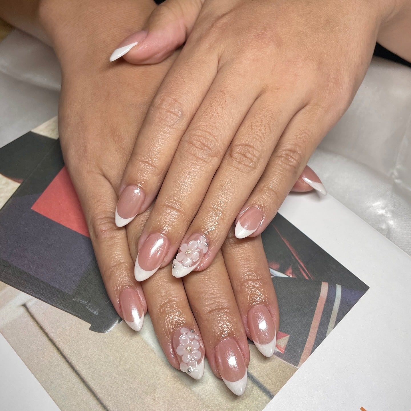 2. Blush Almond French with 3D Flower Detail - classy almond nail ideas