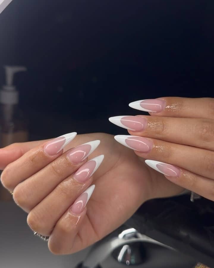 4. Sculpted Pink Almond V-French - classy almond nail ideas