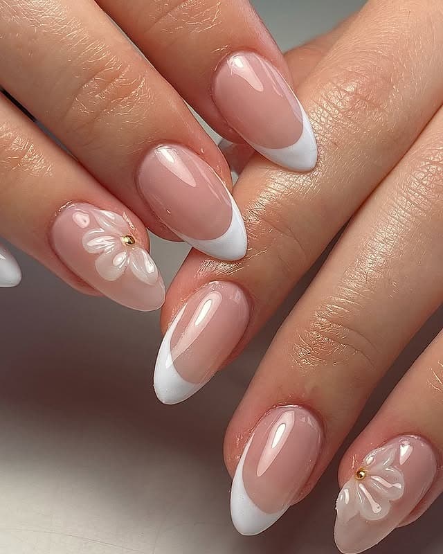 11. Blush Almond French with White Floral Accents - classy almond nail ideas