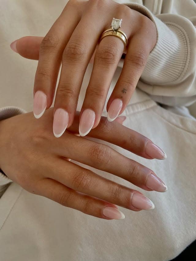 19. Neutral Pink Almond French with Soft White Tips - classy almond nail ideas