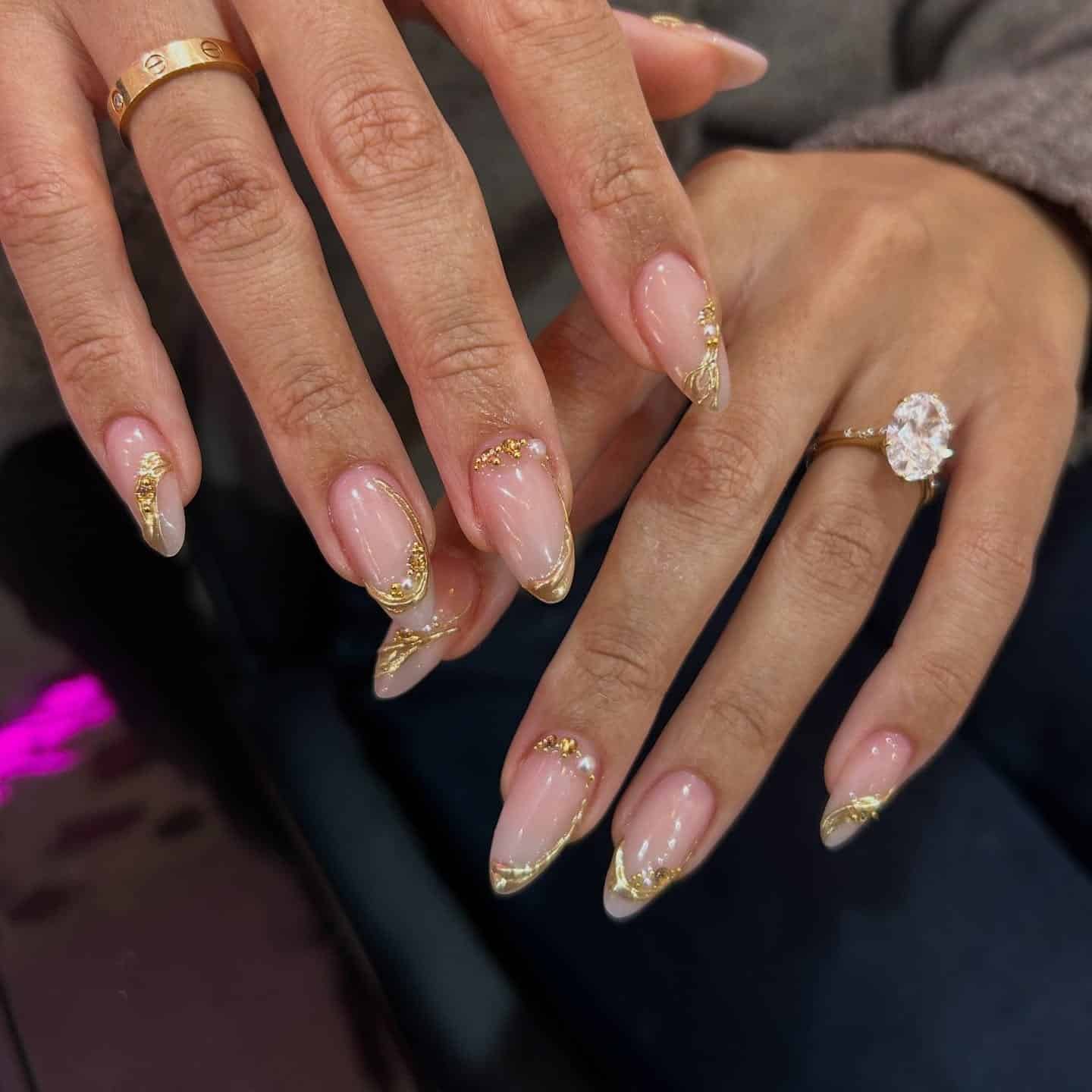 21. Blush Almond French with Sculpted Gold Foil - classy almond nail ideas