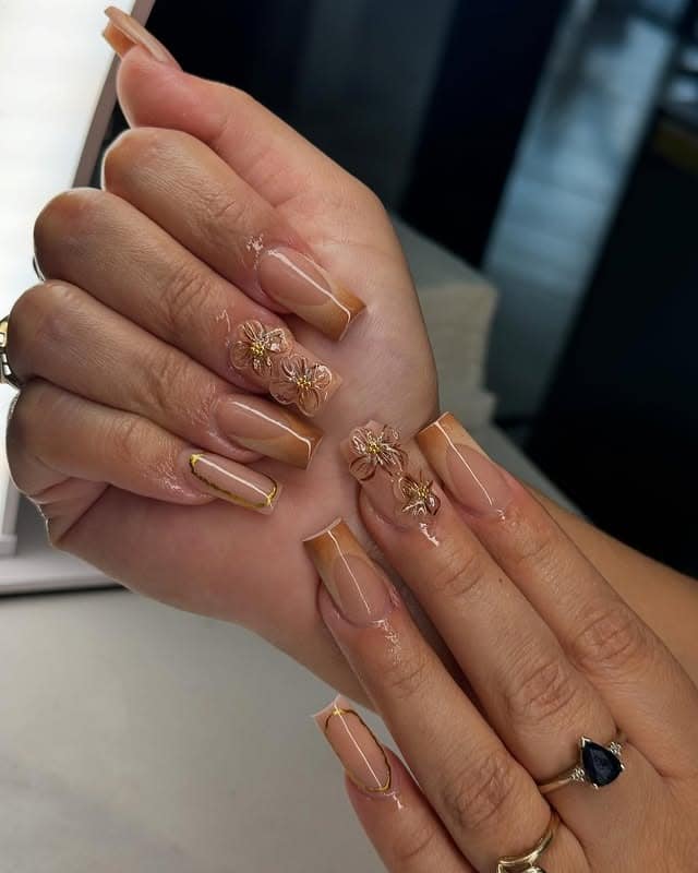 9. Nude Latte Floral Coffin Nails - coffee color nail ideas