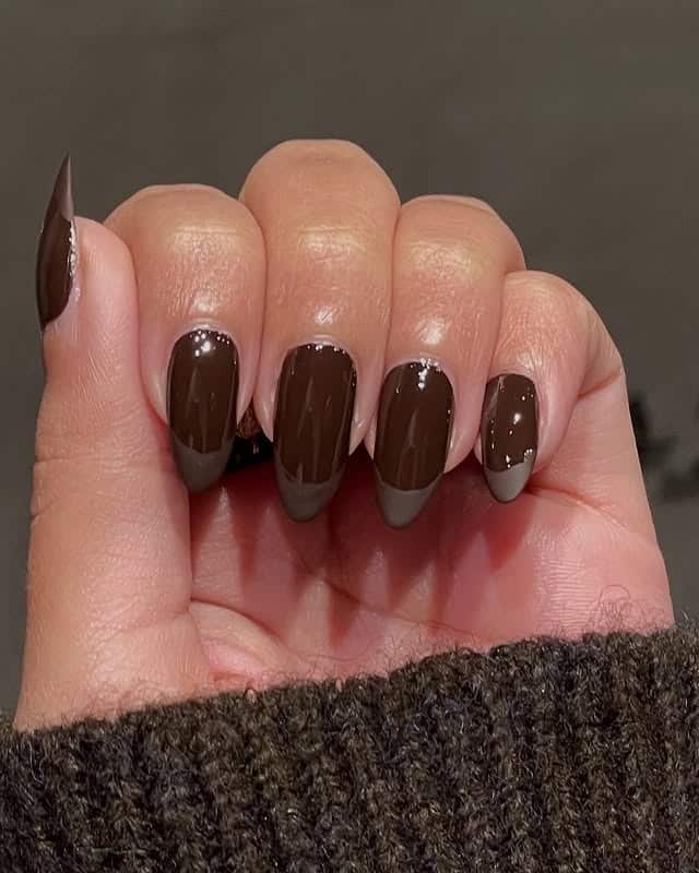 22. Dark Chocolate French Tip Almond Nails - coffee color nail ideas