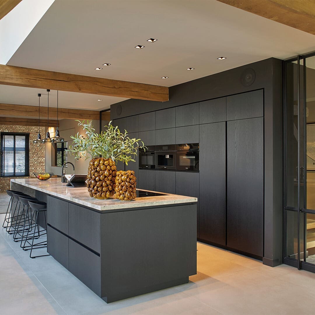 6. Contemporary Black Oak Kitchen with Marble Island - black kitchen cabinets ideas