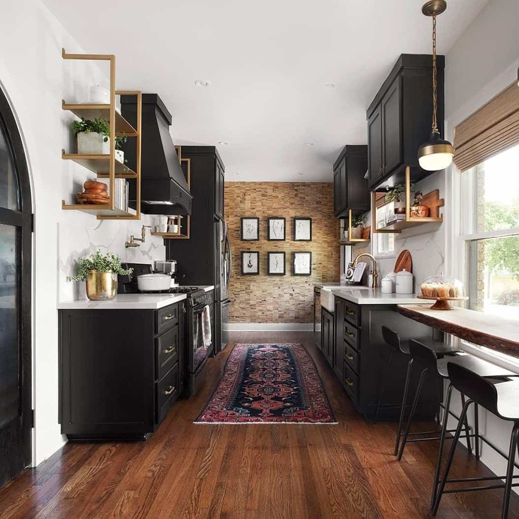 13. Cozy Galley Kitchen with Black Cabinets and Warm Wood Tones - black kitchen cabinets ideas