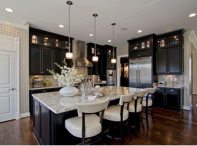 14. Traditional Black Cabinet Kitchen with Cream Granite Island - black kitchen cabinets ideas