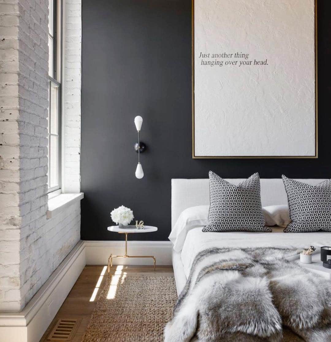10. Chic Black Accent Wall with Soft Gray Textiles - black and gray bedroom ideas