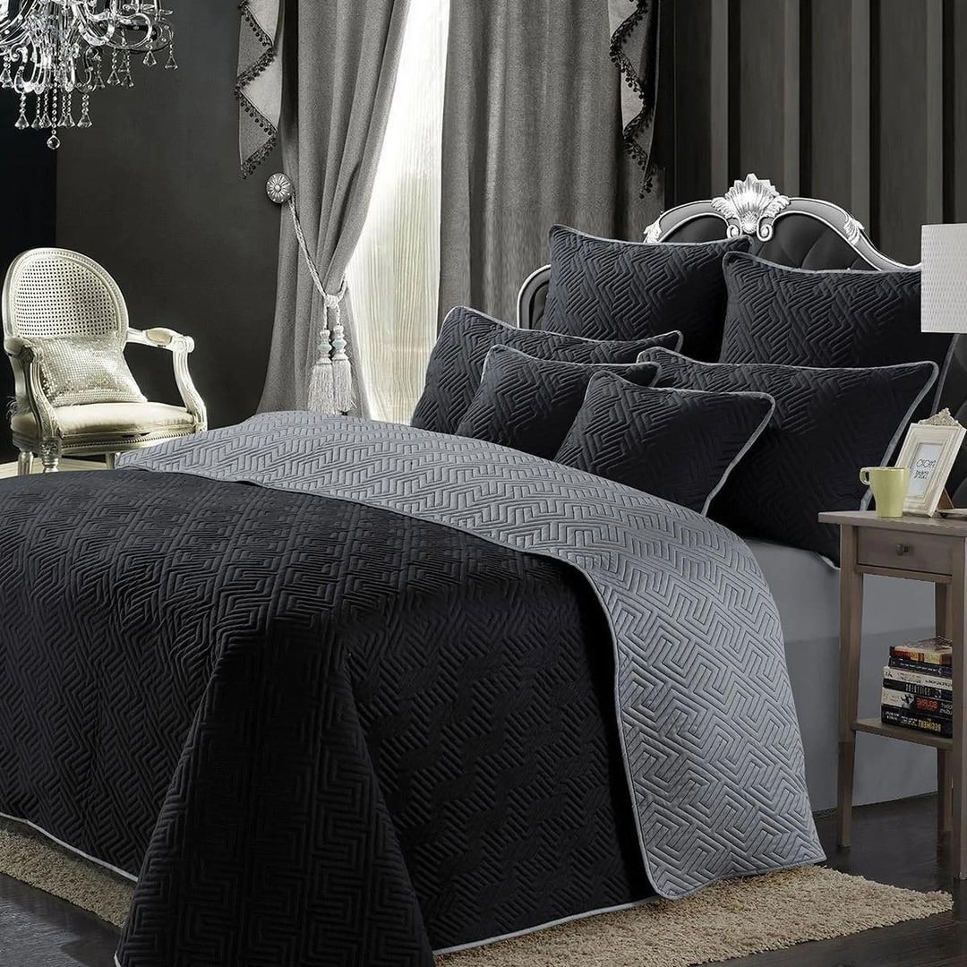 15. Glam Black and Silver Bedroom with Luxe Textiles - black and gray bedroom ideas