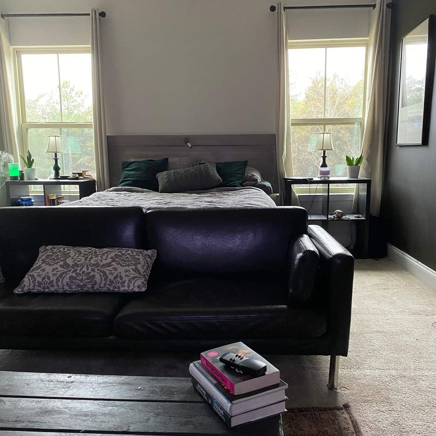 21. Contemporary Black and Gray Bedroom with Lounge-Style Layout - black and gray bedroom ideas