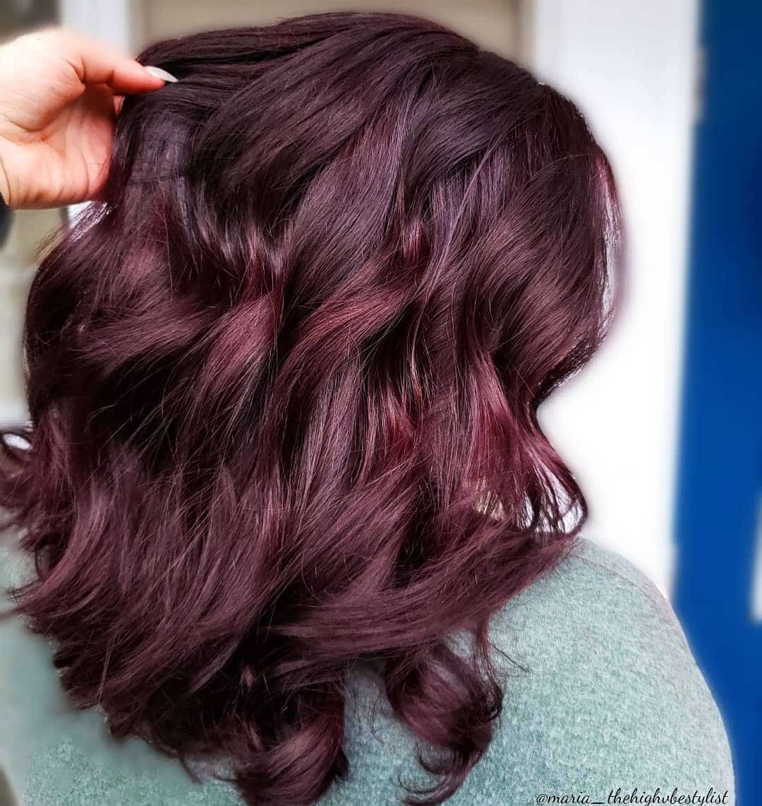 18. Blackened Berry Voluminous Curls - Dark Red Hair Color