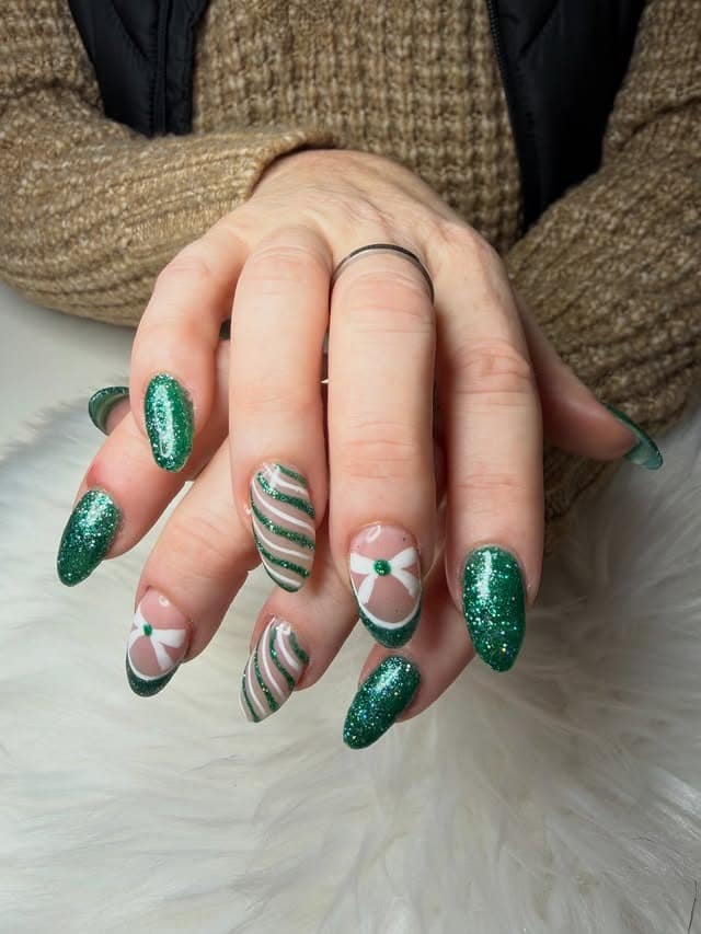 1. Emerald Glitter & Floral Almond Nails - cute green nail ideas