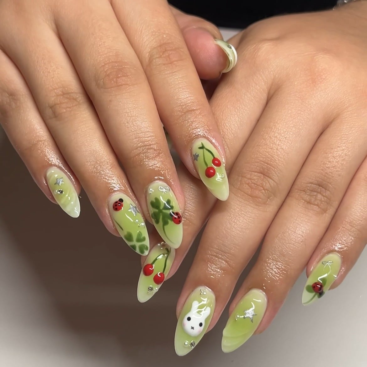 4. Soft Lime Charm Almond Nails - cute green nail ideas