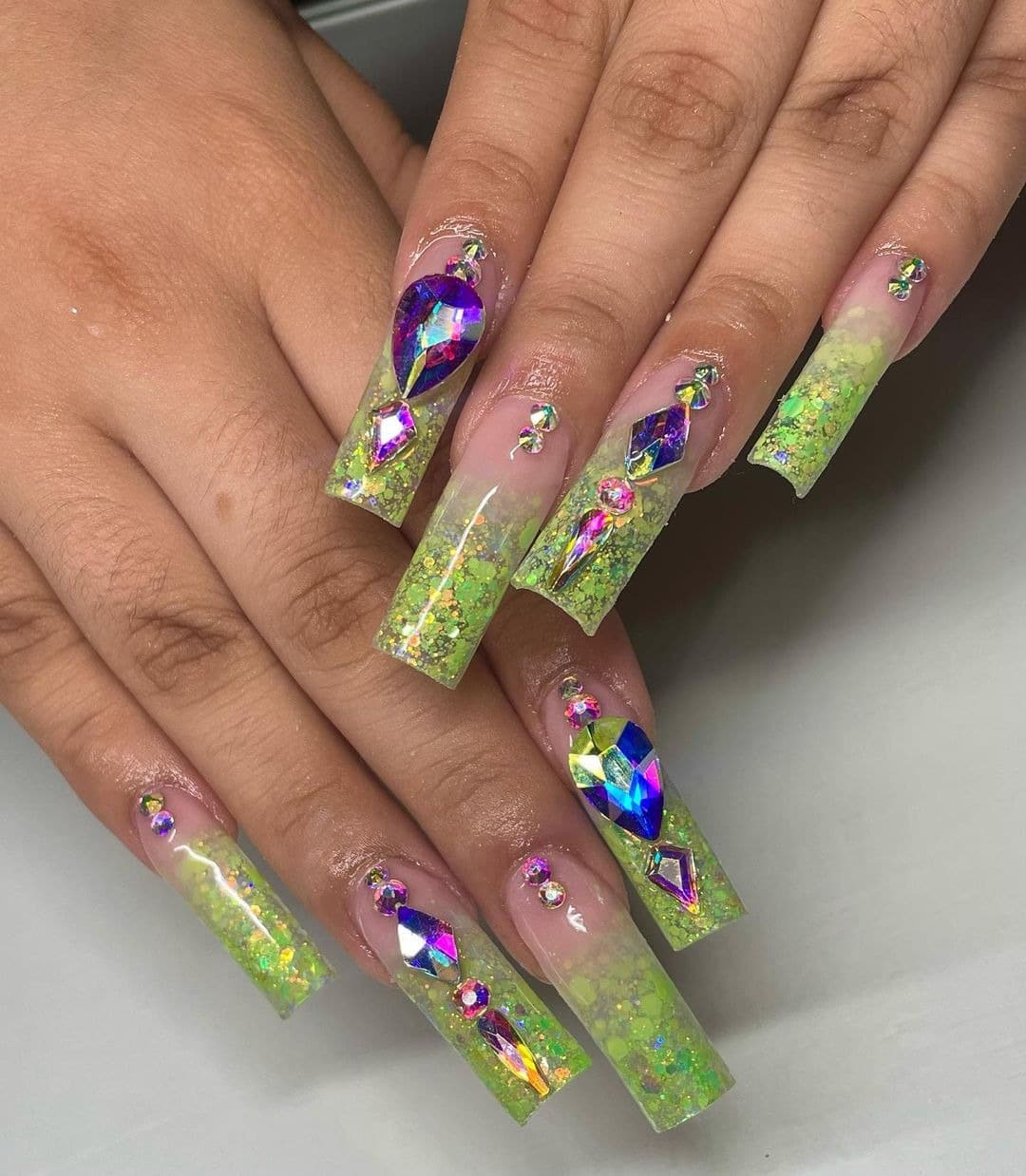 7. Lime Glitter Bling Coffin Nails - cute green nail ideas