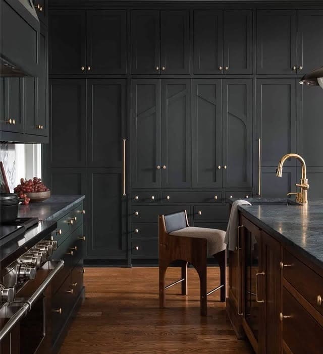 1. Matte Black Cabinetry with Walnut Accents - dark kitchen cabinet ideas