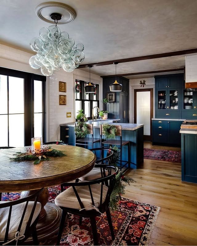 13. Inky Blue Cabinets with Vintage-Inspired Accents - dark kitchen cabinet ideas