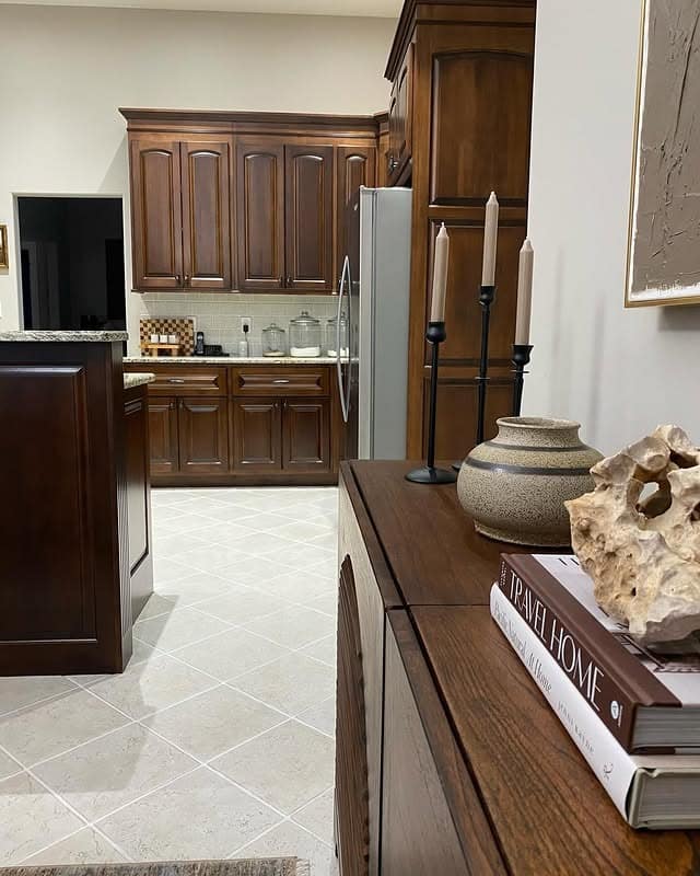 19. Traditional Walnut Cabinets with Raised Panel Detail - dark kitchen cabinet ideas