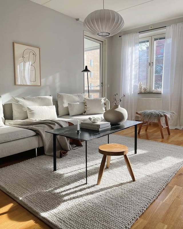 20. Scandinavian White Living Room with Natural Wood - cozy living room ideas