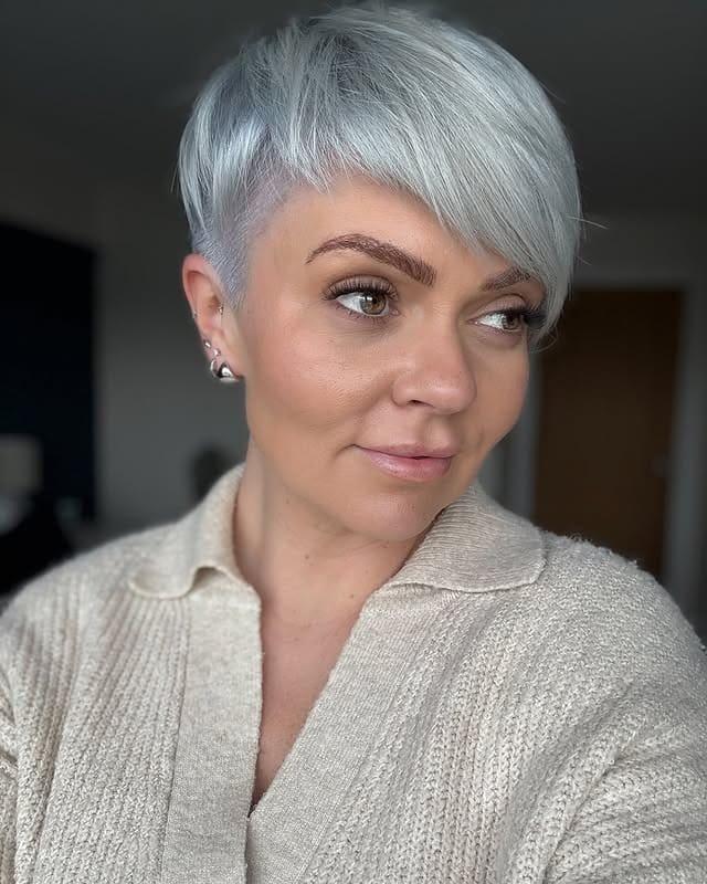 8. Icy Platinum Feathered Pixie - Pixie Haircuts