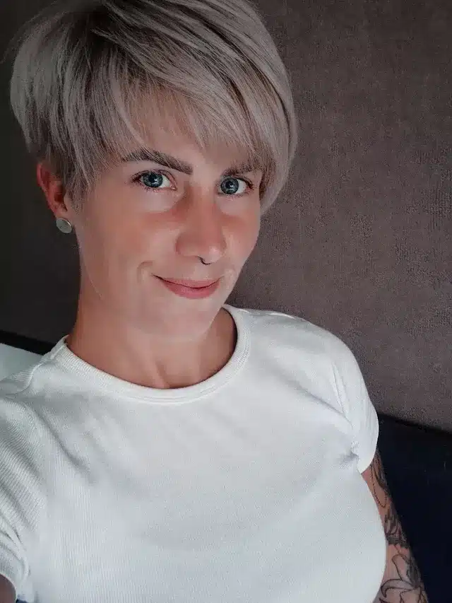 10. Sandy Blonde Classic Pixie Crop - Pixie Haircuts