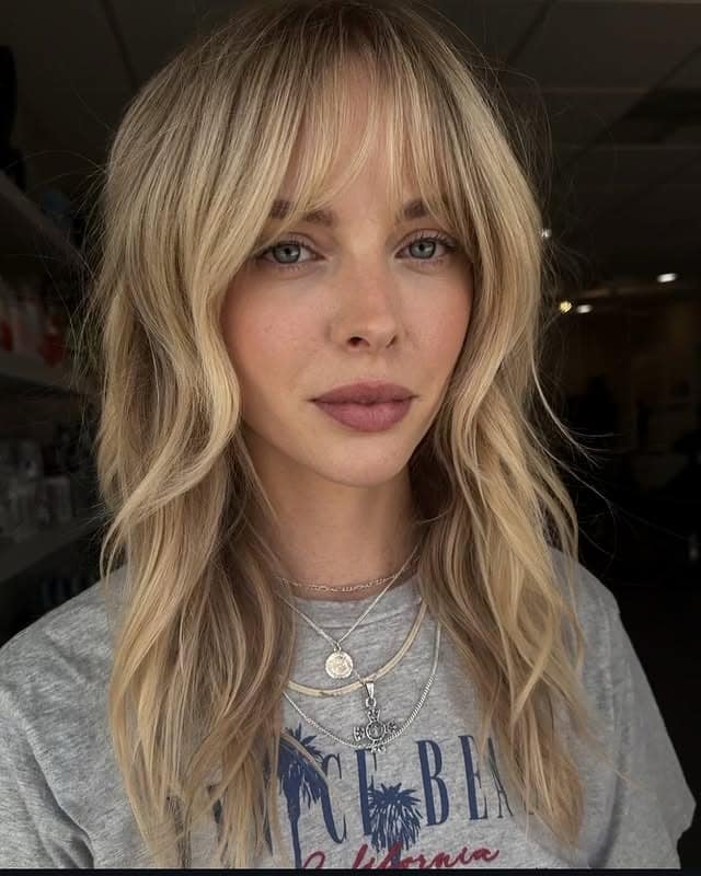 18. Creamy Blonde Layered Shag with Soft Fringe - Medium Length Shag Hairstyles