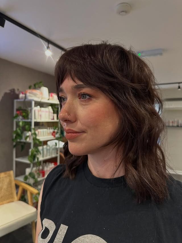 19. Cocoa Brown Wavy Shag with Blended Bangs - Medium Length Shag Hairstyles