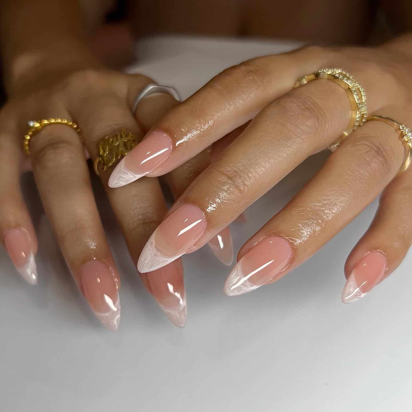 2. Peach Blush French Fade Almond Nails - elegant bridal nail ideas