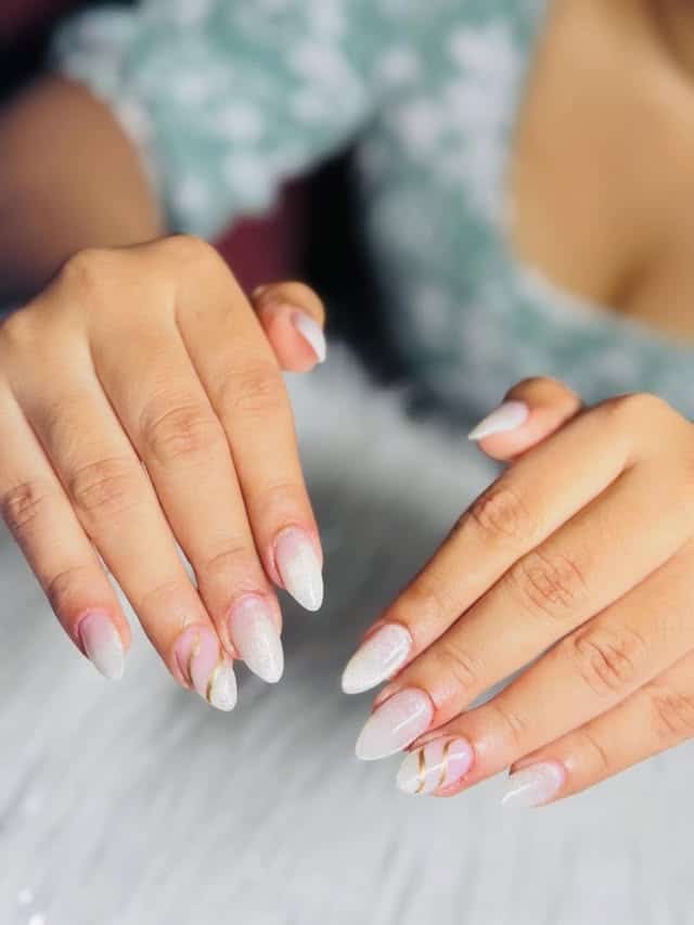 4. Pearl White Ombré Almond Nails with Gold Accents - elegant bridal nail ideas