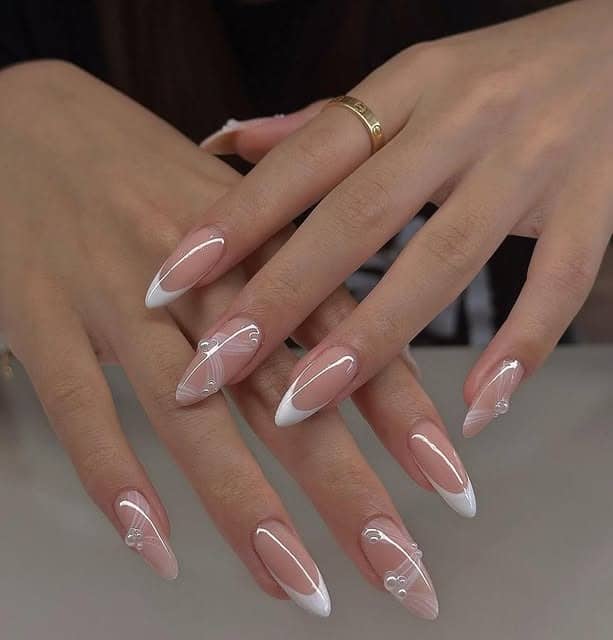 8. Modern Micro French Almond Nails with Abstract White Lines - elegant bridal nail ideas