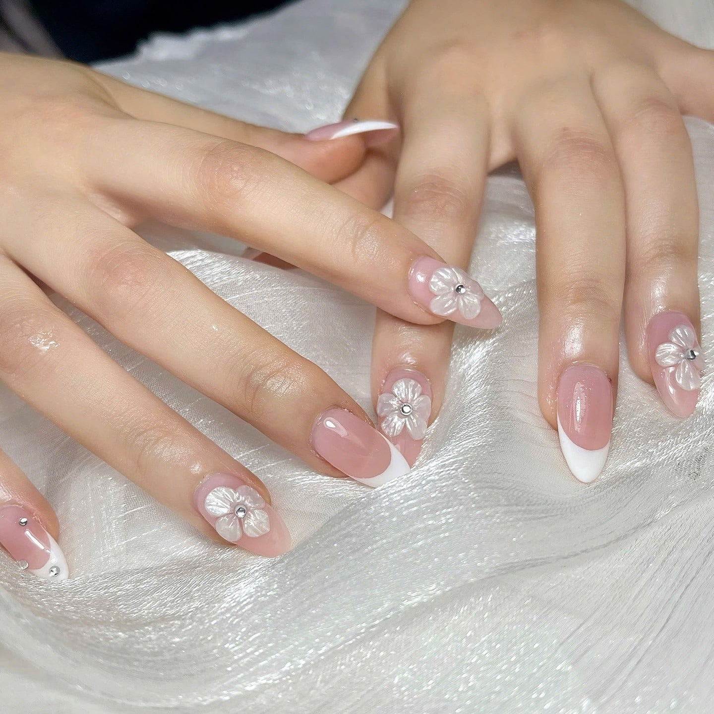 13. Soft Pink Almond French Tips with 3D Floral Embellishments - elegant bridal nail ideas