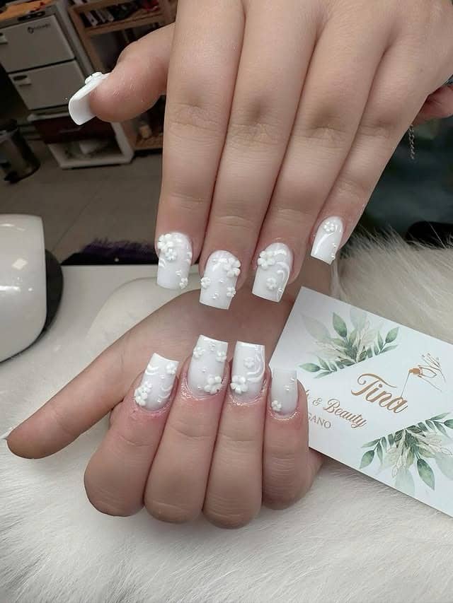 16. Full White Square Nails with 3D Floral Texture - elegant bridal nail ideas