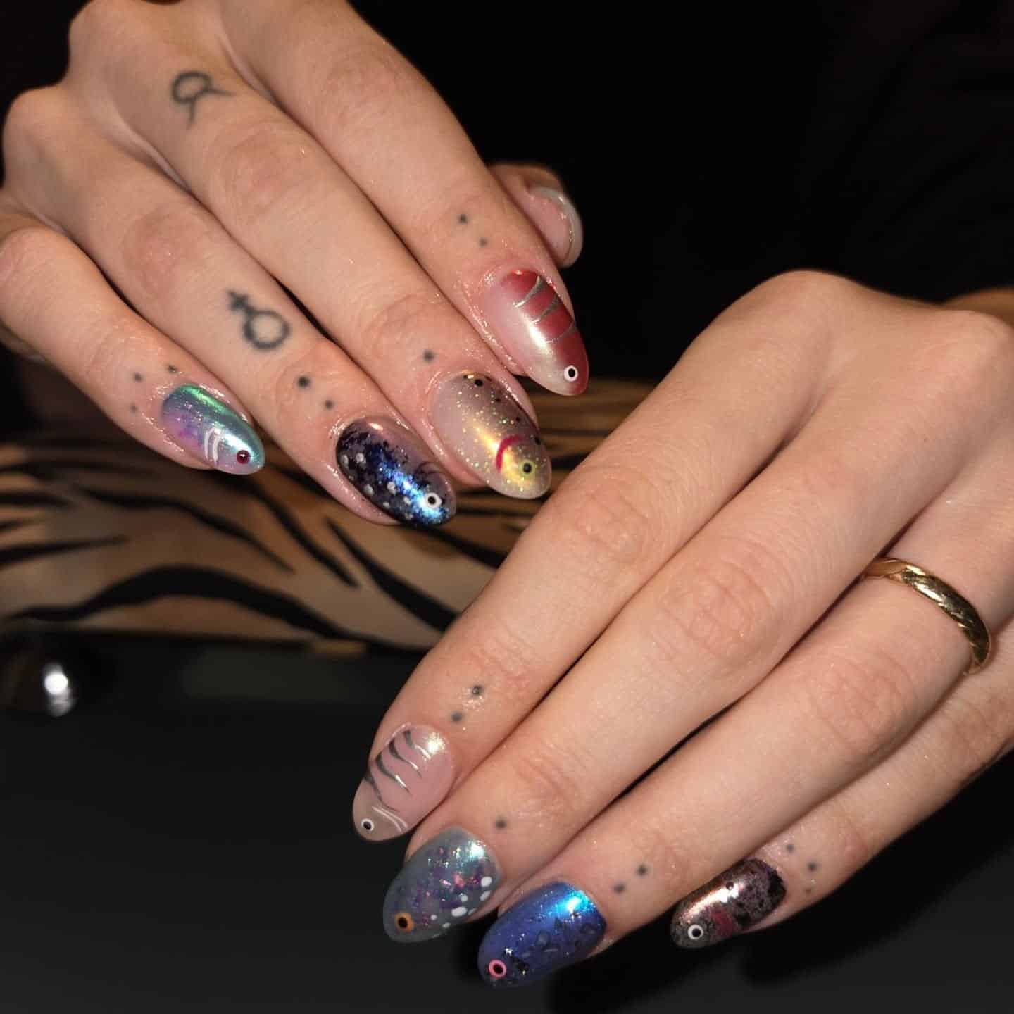 1. Cosmic Glitter Fish Almond Nails - fish nail ideas