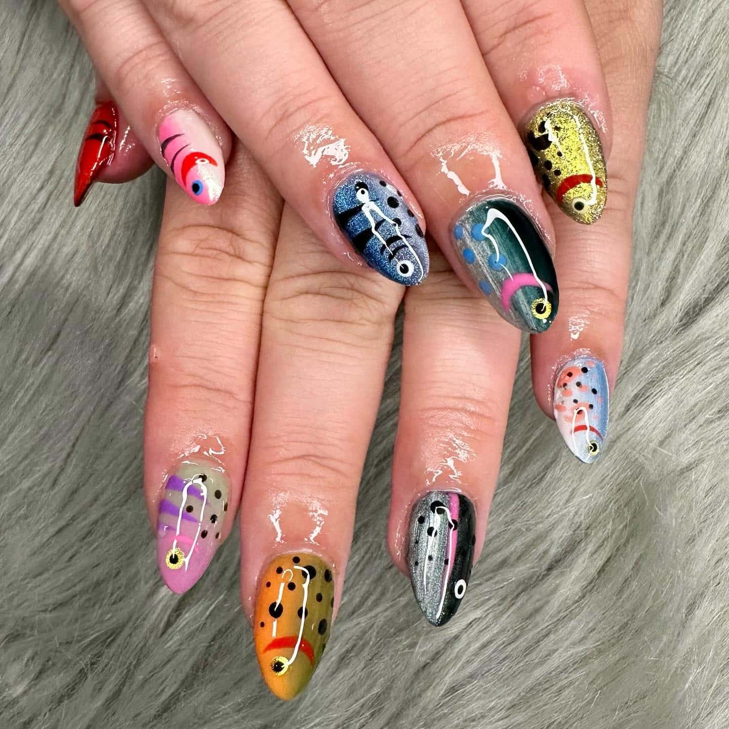 2. Metallic Lure-Inspired Stiletto Nails - fish nail ideas