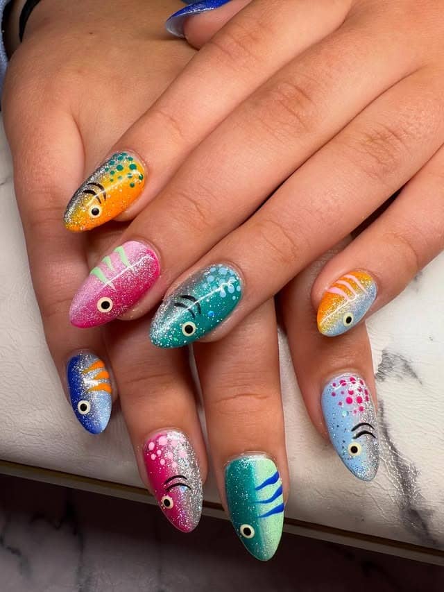 8. Glitter Gradient Tropical Fish Nails - fish nail ideas