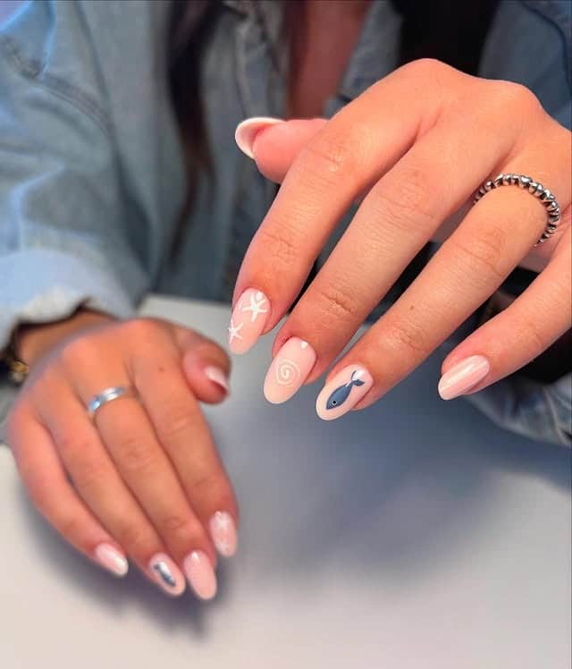 22. Blush Almond Nails with Minimal Coastal Fish Accent - fish nail ideas