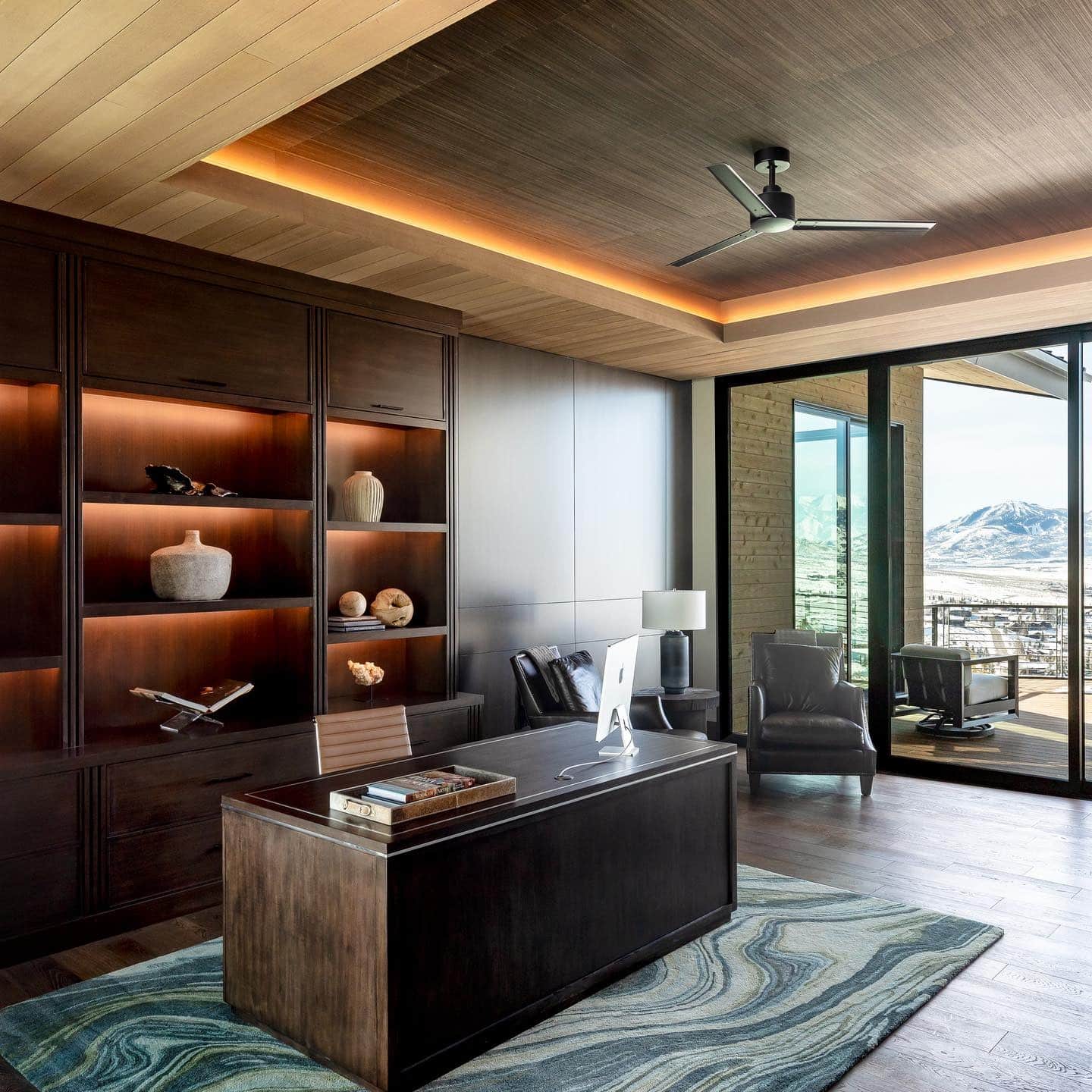 1. Walnut & Charcoal Executive Office with Warm LED Accents - masculine home office ideas