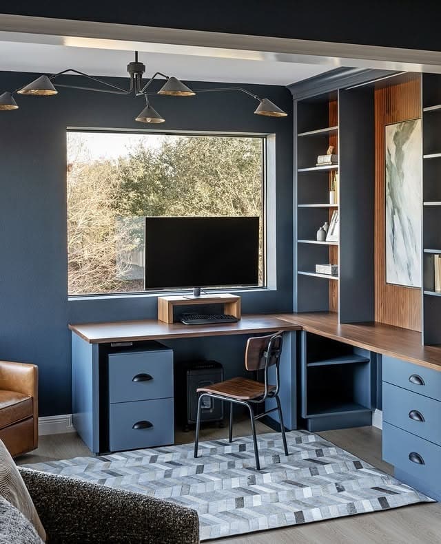 9. Navy Corner Office with Custom L-Shaped Desk - masculine home office ideas