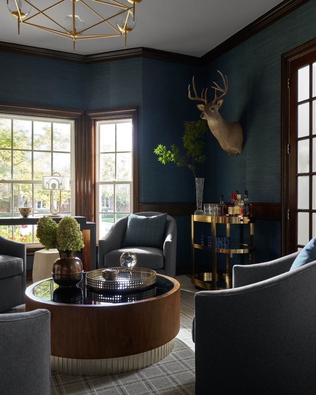 18. Navy Lounge Office with Brass Bar Cart Accents - masculine home office ideas