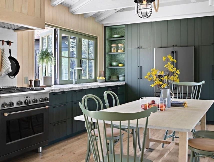 2. Forest Green Shaker Cabinets with Light Wood Details - dark cabinets kitchen ideas