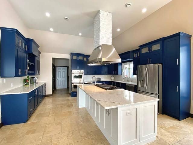 4. Navy Blue Cabinets with Cream Island Contrast - dark cabinets kitchen ideas