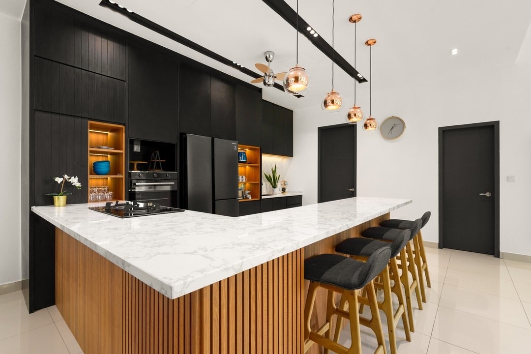 5. Matte Black Cabinets with Marble Waterfall Island - dark cabinets kitchen ideas